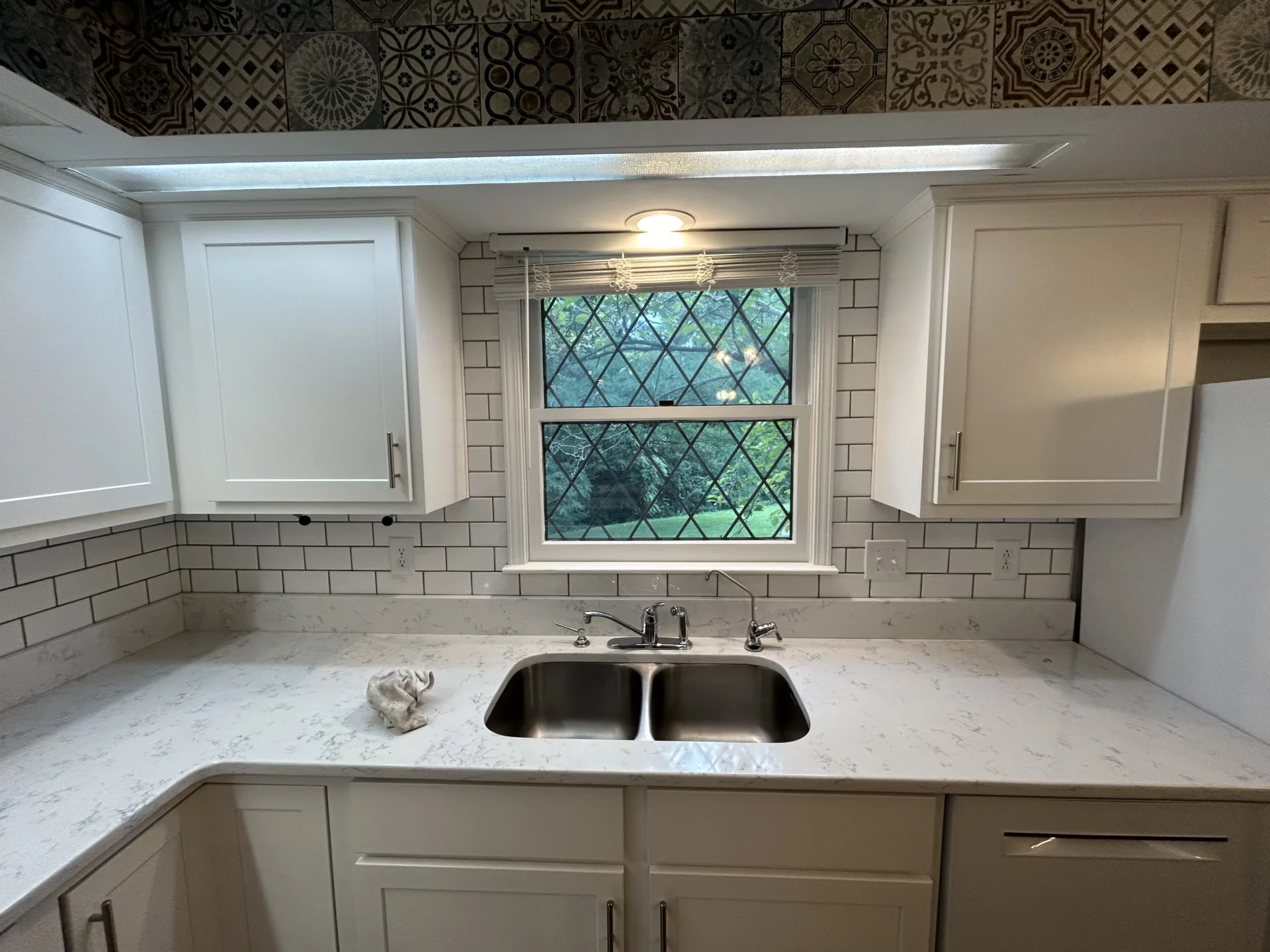 Elite Floors KY kitchen tile installation remodel update cabinets