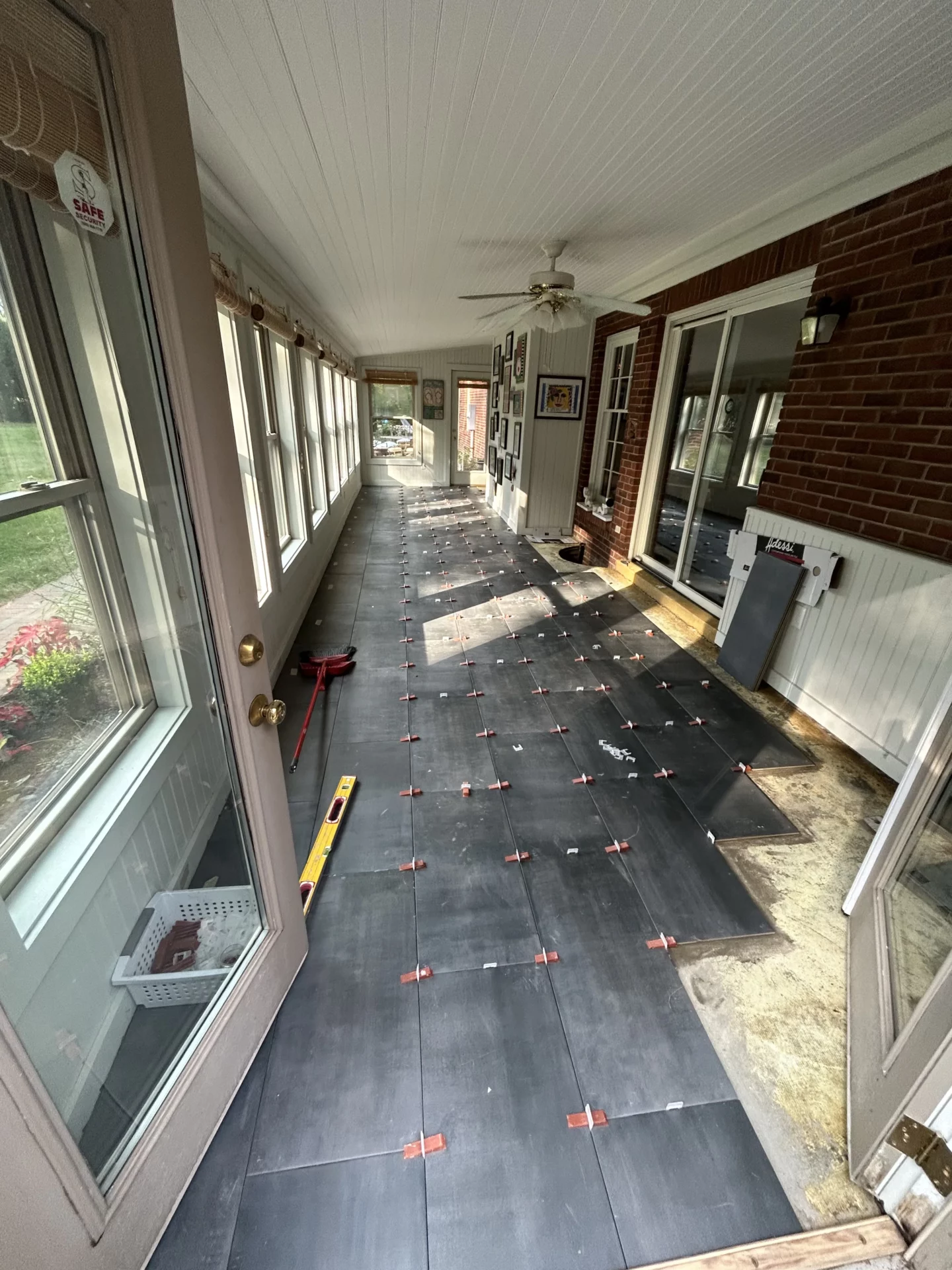 Elite Floors KY sunroom exterior tile installation remodel update