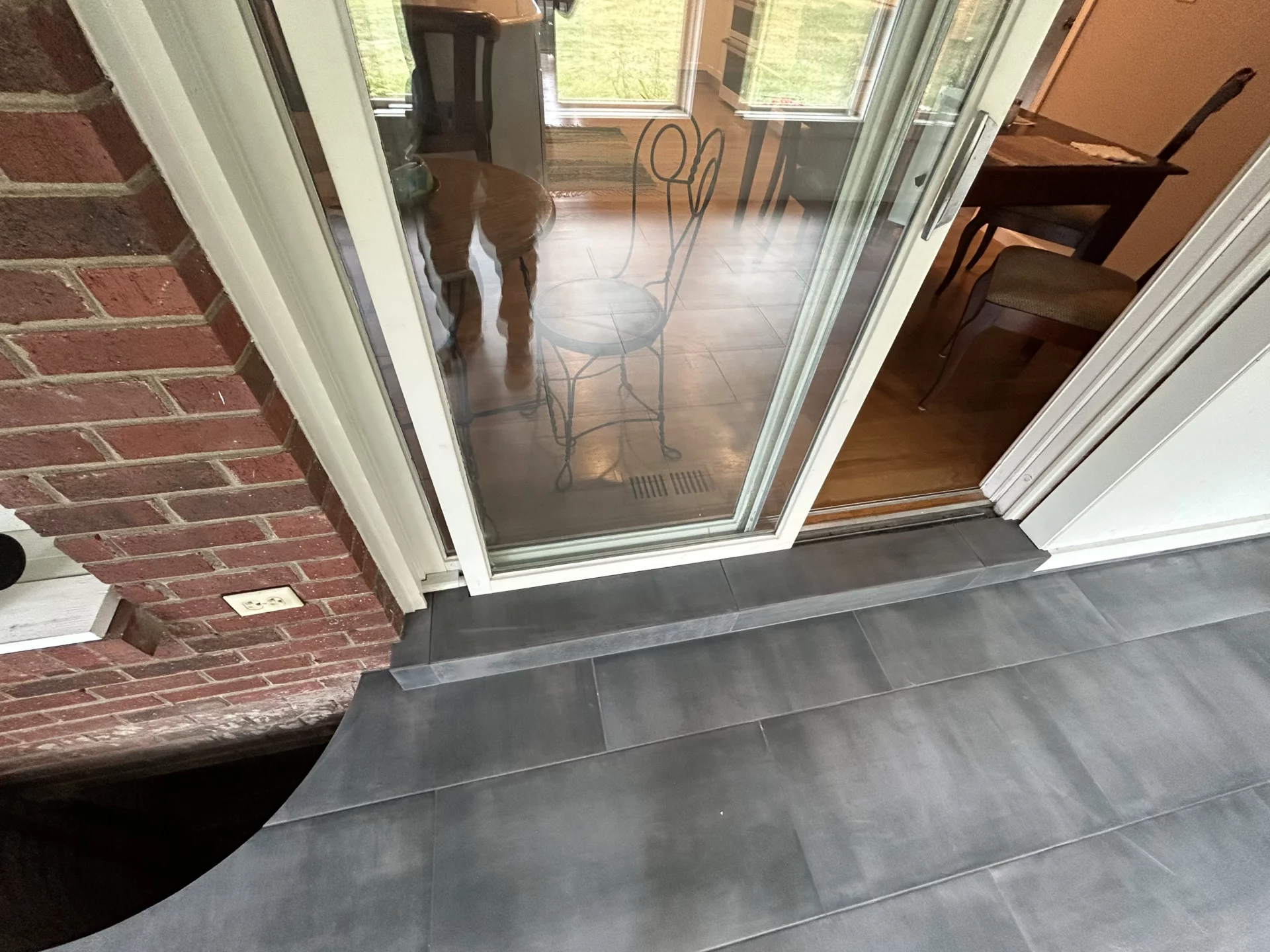 Elite Floors KY sunroom exterior tile installation remodel update