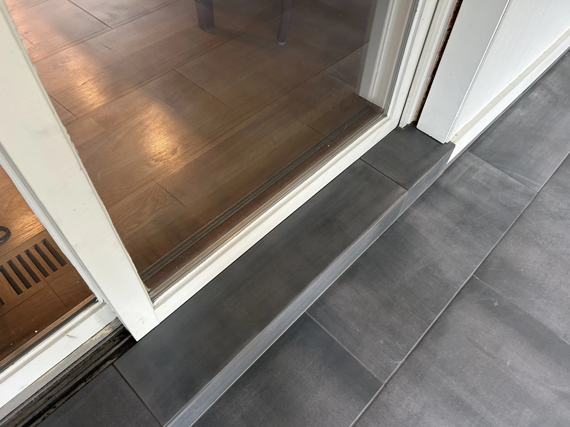 Elite Floors KY sunroom exterior tile installation remodel update