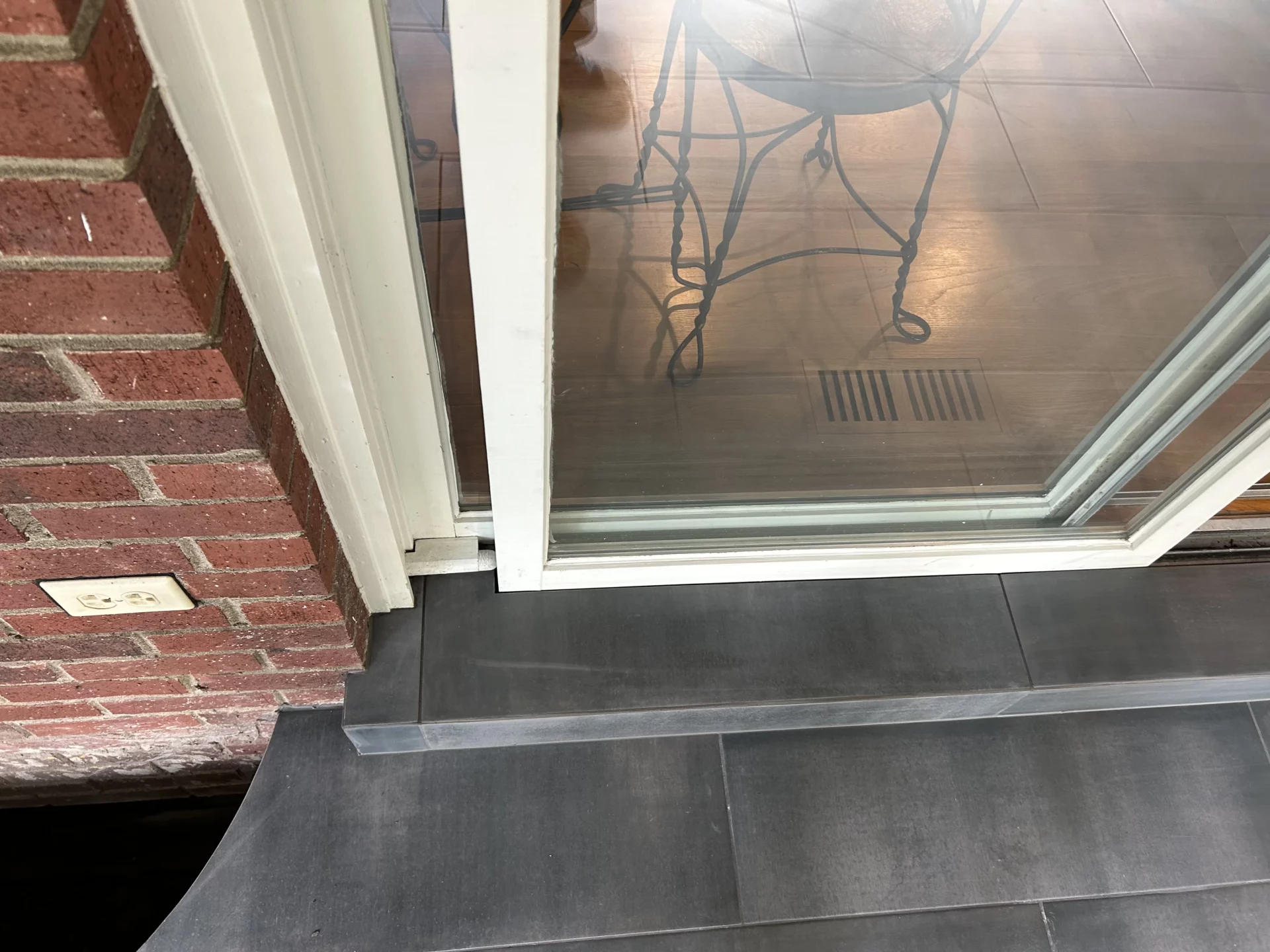 Elite Floors KY sunroom exterior tile installation remodel update