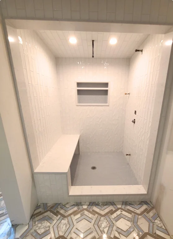 Modern white shower with bench